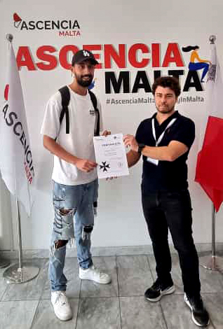 Business English student receiving certificate at Ascencia Malta English school Malta