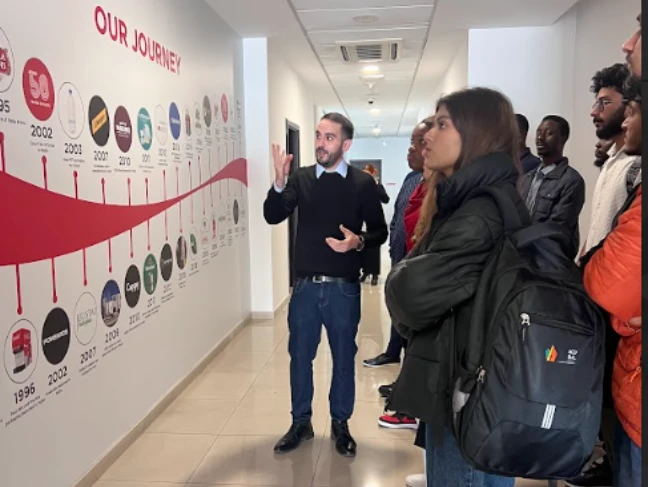 Ascencia Malta students learning during an educational visit to a company facility