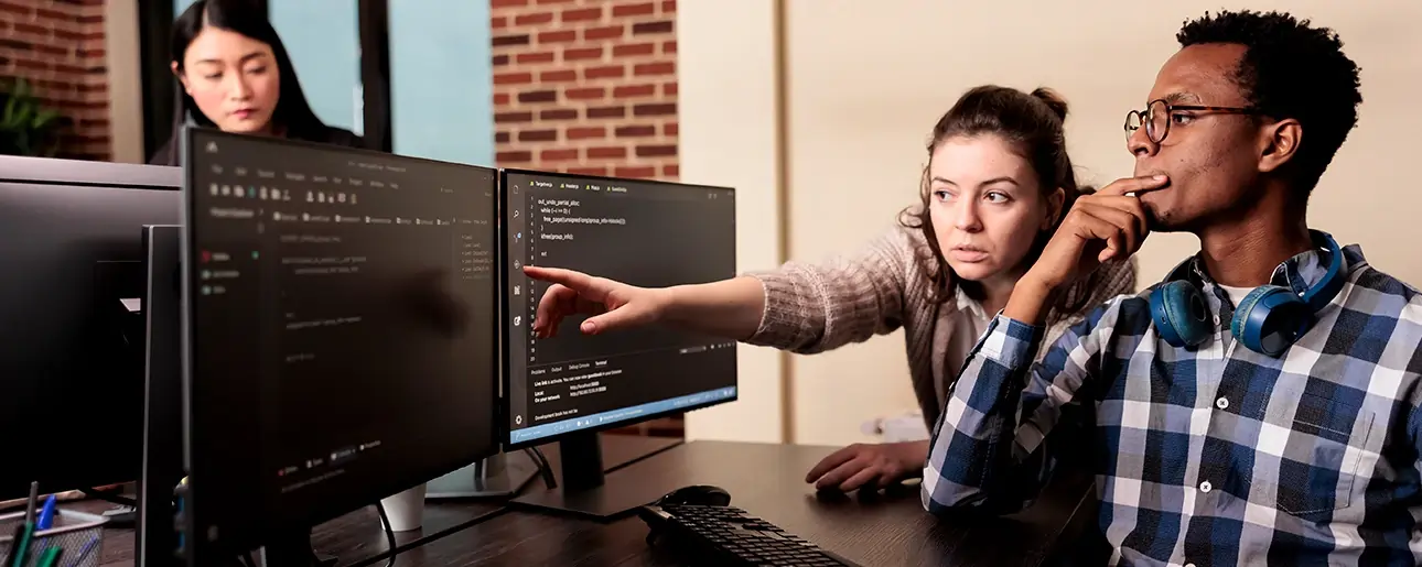 Students collaborating on coding and software development during the Bachelor of Science in Computer Science programme at Ascencia Malta