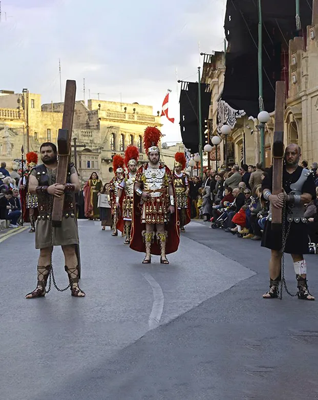 Good Friday procession in Malta with Roman soldiers reenactment, showcasing cultural heritage and religious traditions